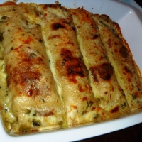 Image of Roasted Chicken Enchiladas With Poblano Sour Cream Sauce Recipe, Group Recipes