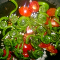 Image of Fiddlehead Fern Garlic Cherry Tomato And Brown Rice Stuffed Peppers Recipe, Group Recipes